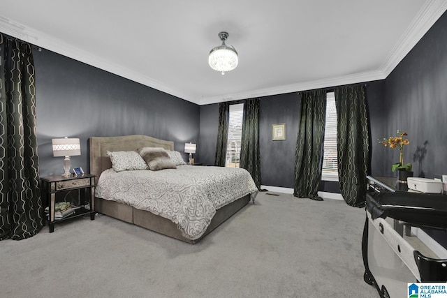 carpeted bedroom with baseboards and ornamental molding