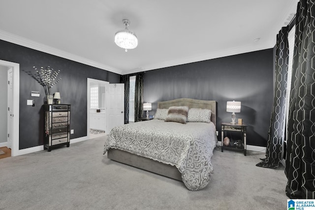 bedroom with carpet floors, crown molding, and baseboards