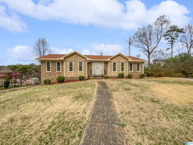 ranch-style house with a front yard