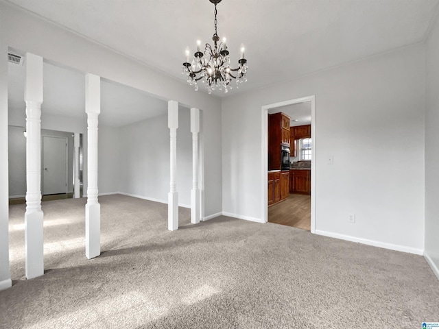 unfurnished dining area featuring carpet floors, visible vents, and baseboards