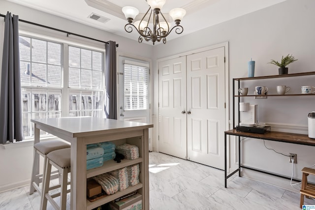 home office with marble finish floor, a raised ceiling, visible vents, and an inviting chandelier