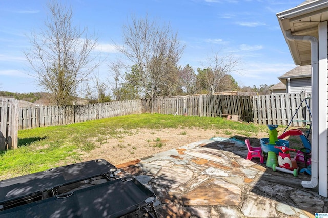 view of yard with a fenced backyard and a patio