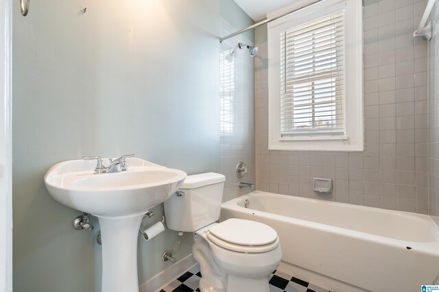 full bath featuring bathtub / shower combination and toilet