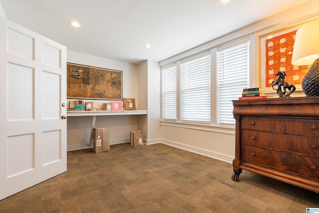 interior space with carpet, built in study area, baseboards, and recessed lighting