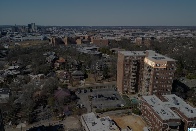 birds eye view of property with a view of city