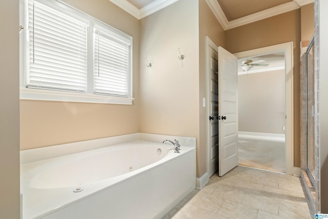 bathroom featuring crown molding, a bath, a ceiling fan, and baseboards