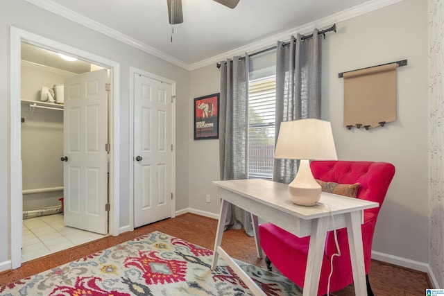 office with a ceiling fan, baseboards, and ornamental molding