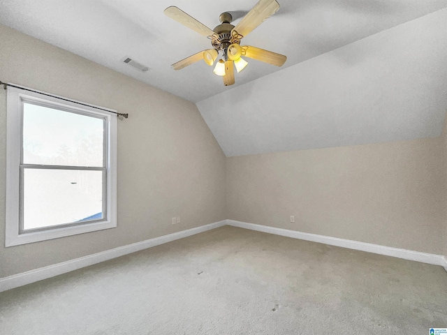 bonus room with visible vents, baseboards, carpet, lofted ceiling, and ceiling fan