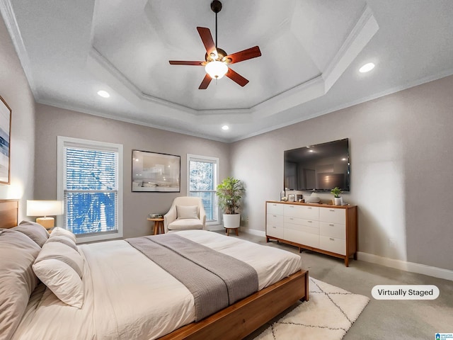 bedroom featuring recessed lighting, baseboards, a raised ceiling, and crown molding