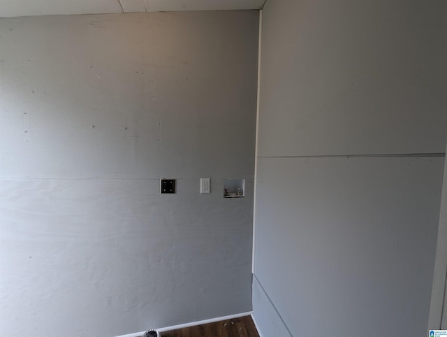 laundry room with laundry area, washer hookup, and wood finished floors