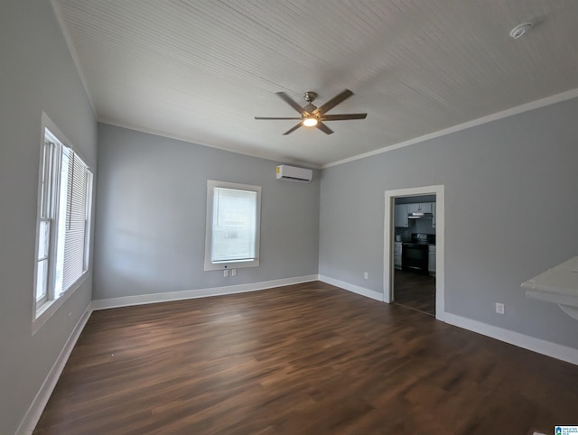 spare room with dark wood-style floors, baseboards, crown molding, and a wall mounted air conditioner