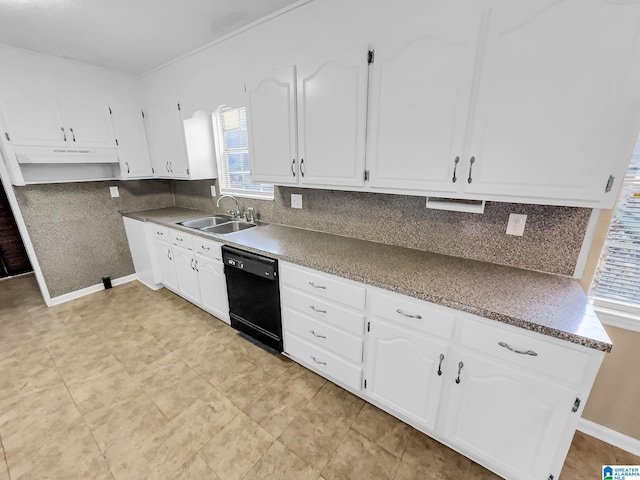 kitchen with black dishwasher, white cabinets, and a sink