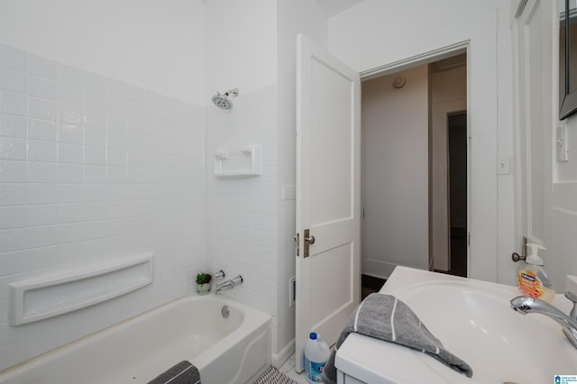 full bathroom featuring shower / washtub combination and a sink