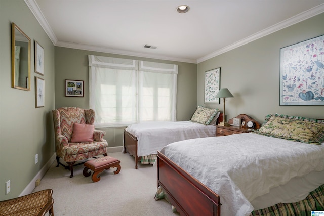 carpeted bedroom with ornamental molding, visible vents, and baseboards