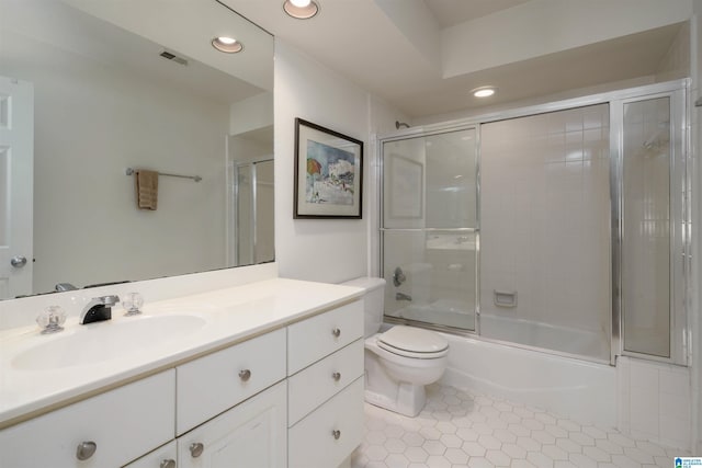 bathroom with tile patterned flooring, vanity, visible vents, and recessed lighting