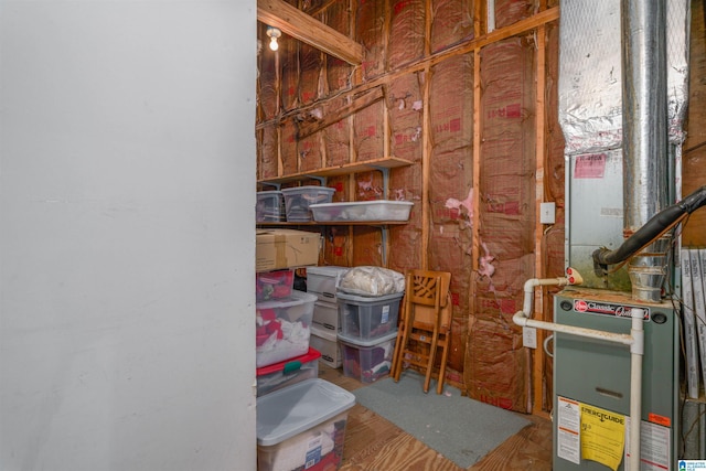 storage room featuring heating unit