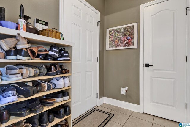 interior space with light tile patterned floors