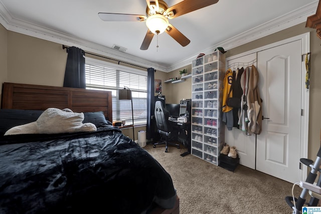 carpeted bedroom featuring a ceiling fan, visible vents, and crown molding