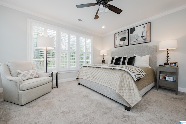 carpeted bedroom featuring crown molding, recessed lighting, visible vents, a ceiling fan, and baseboards