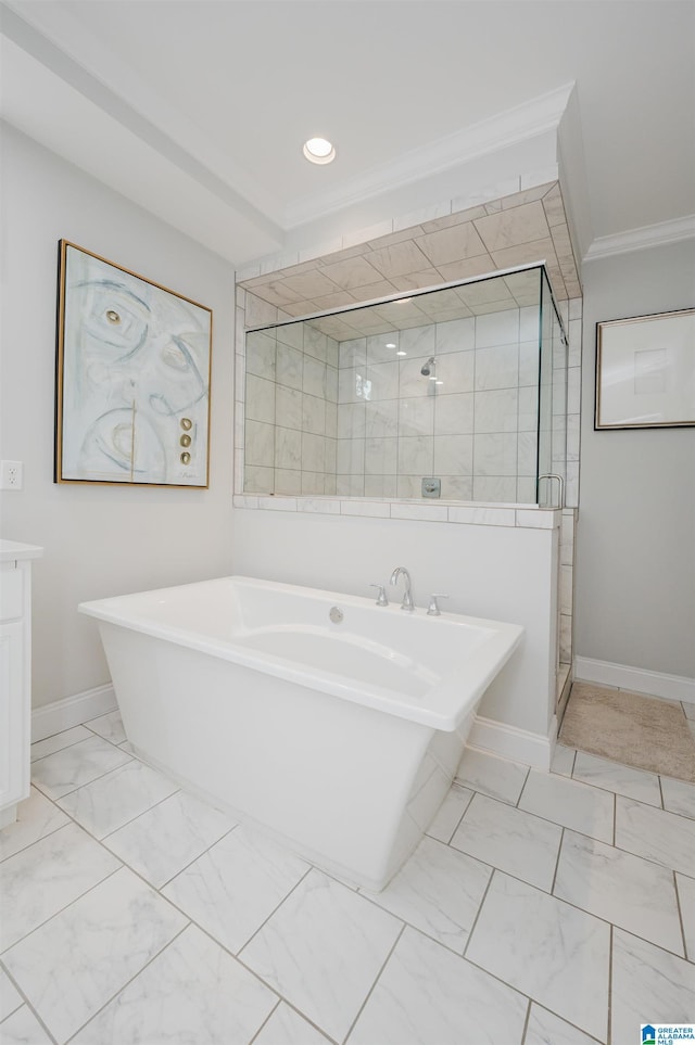 bathroom with baseboards, marble finish floor, a soaking tub, a stall shower, and crown molding