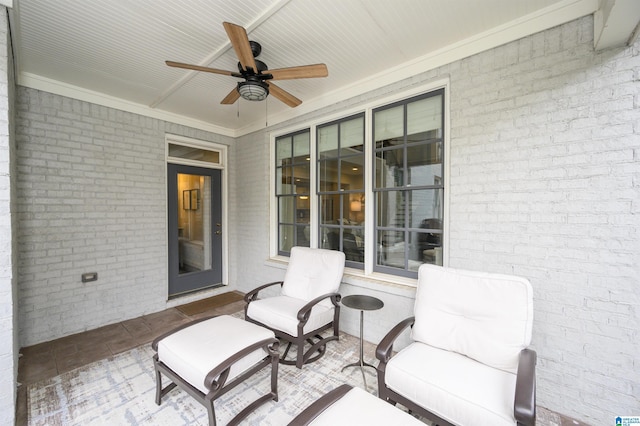 view of patio / terrace featuring ceiling fan