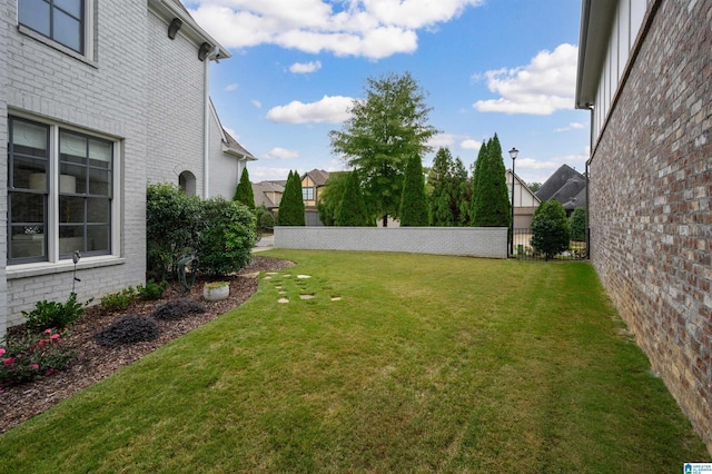 view of yard featuring fence