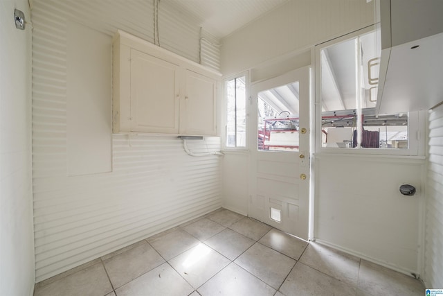 interior space with light tile patterned floors