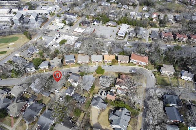 birds eye view of property with a residential view