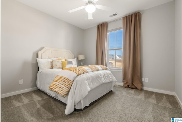 bedroom featuring a ceiling fan, carpet flooring, visible vents, and baseboards