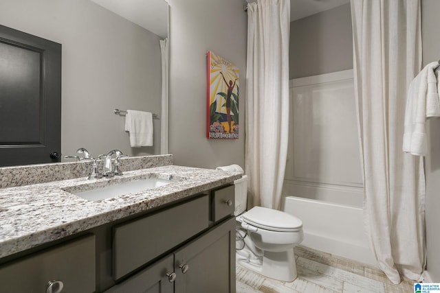 bathroom with toilet, shower / bath combination with curtain, and vanity