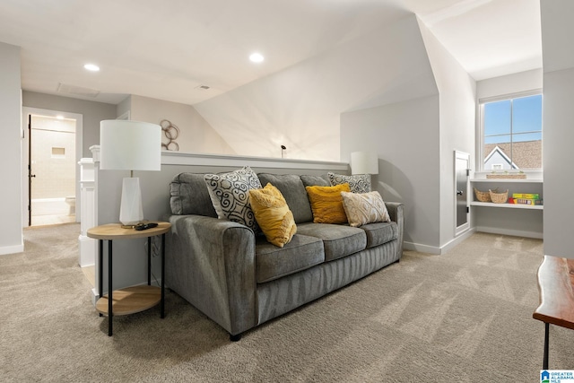 carpeted living area with recessed lighting, visible vents, and baseboards