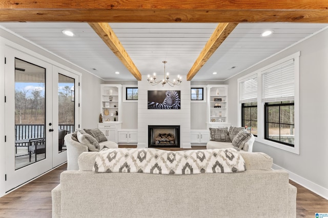 1165 Cedar Creek Dr, Sylacauga, AL 35151 - living room with baseboards, dark wood-style flooring, beam ceiling, and french doors