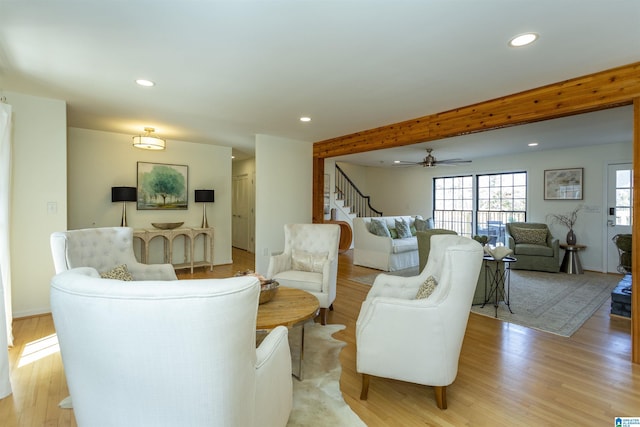 living area with light wood finished floors, recessed lighting, stairs, and ceiling fan