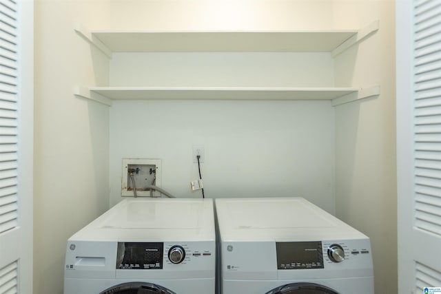 laundry room featuring laundry area and separate washer and dryer