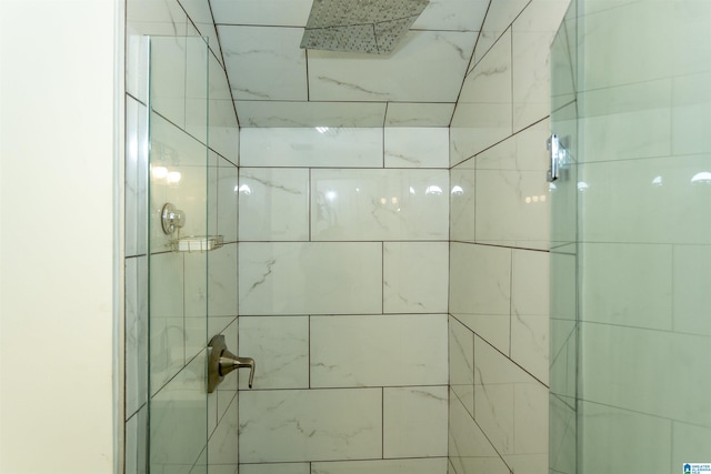 interior space featuring a tile shower