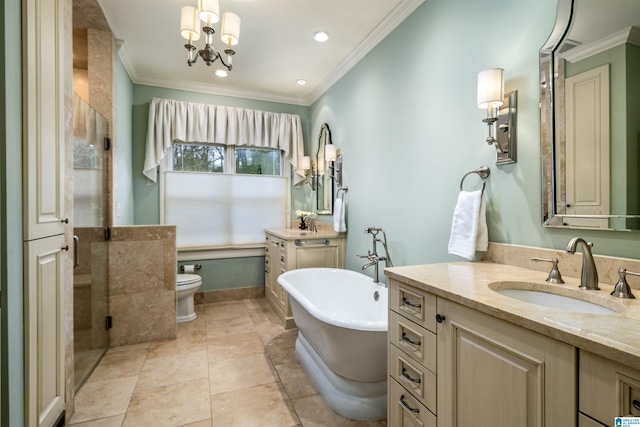 bathroom featuring toilet, ornamental molding, a sink, tile patterned flooring, and a soaking tub