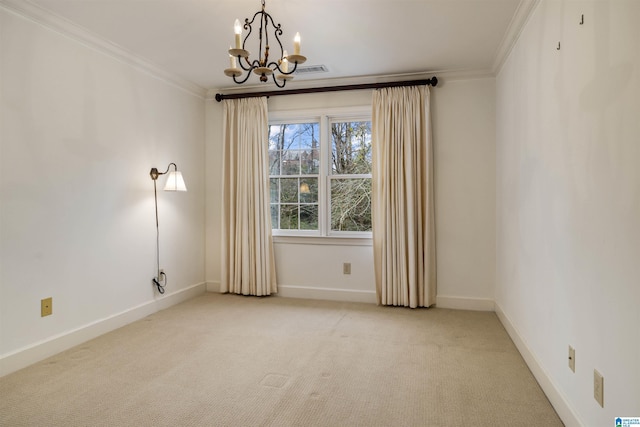 spare room featuring visible vents, light colored carpet, an inviting chandelier, and crown molding