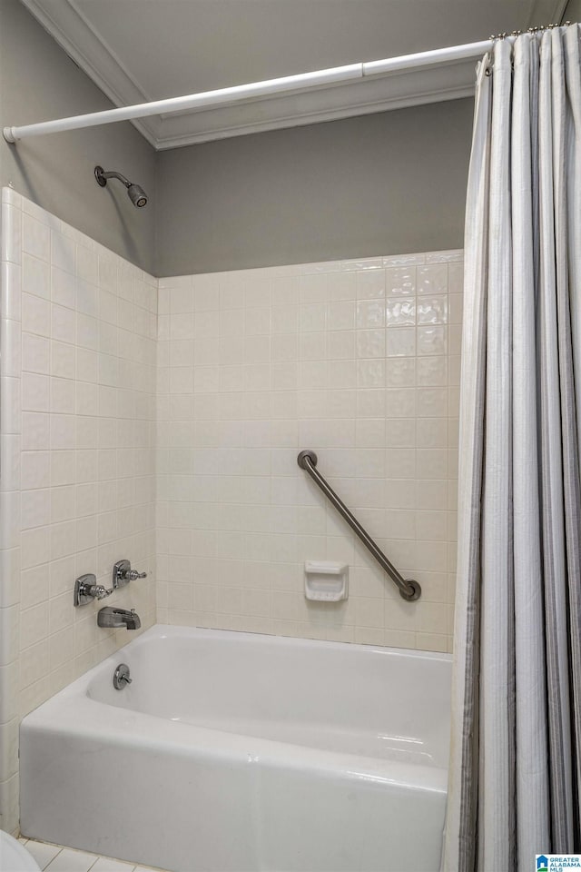 bathroom with shower / bathtub combination with curtain