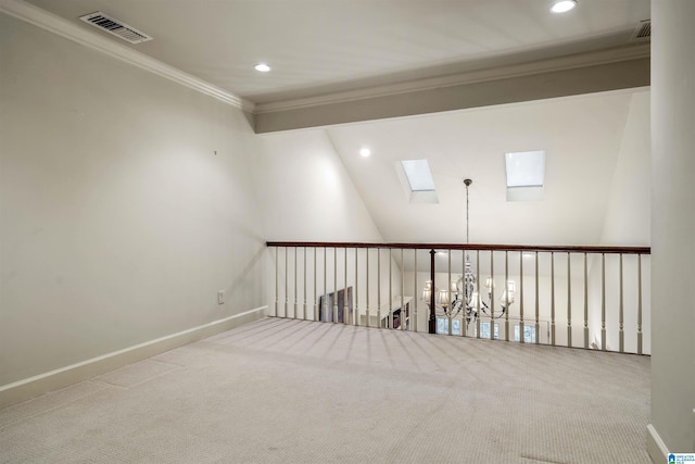 unfurnished room with visible vents, crown molding, carpet flooring, recessed lighting, and a skylight