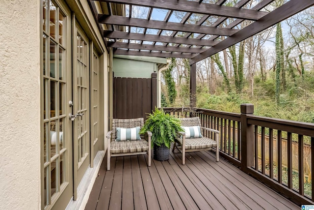 wooden terrace with a pergola