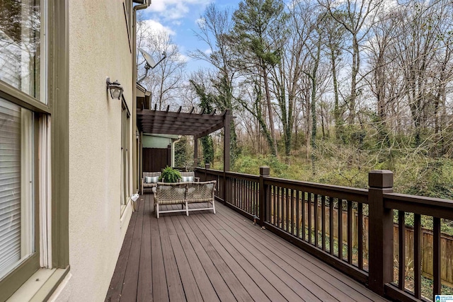 wooden deck with a pergola