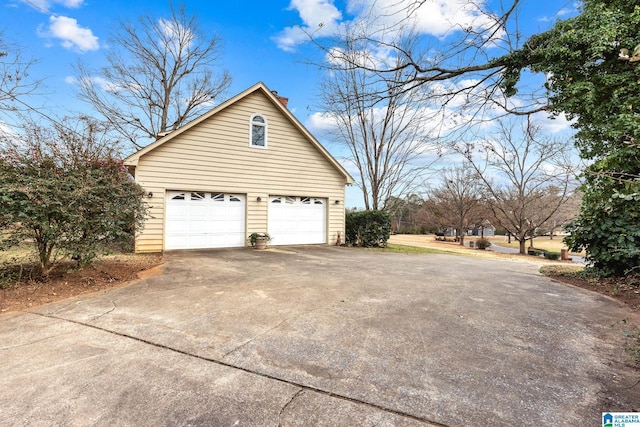 garage featuring driveway