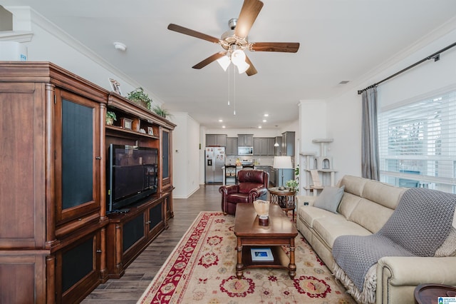 living area featuring visible vents, dark wood-style floors, ceiling fan, crown molding, and recessed lighting