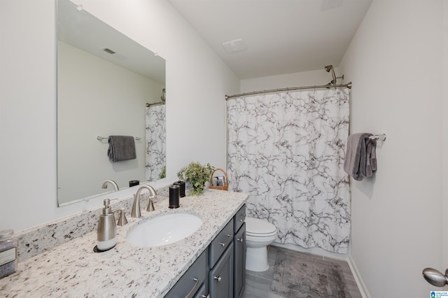 bathroom with toilet, a shower with curtain, visible vents, and vanity