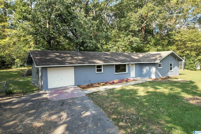 ranch-style house featuring a garage, aphalt driveway, a front lawn, and fence