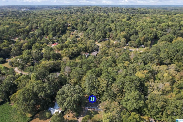 aerial view featuring a view of trees