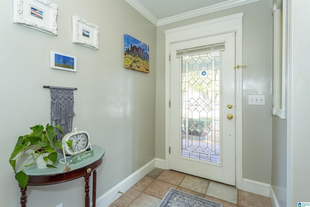 doorway to outside featuring baseboards and crown molding