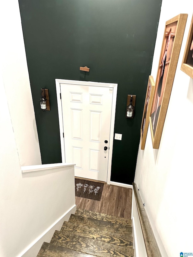 doorway with wood finished floors