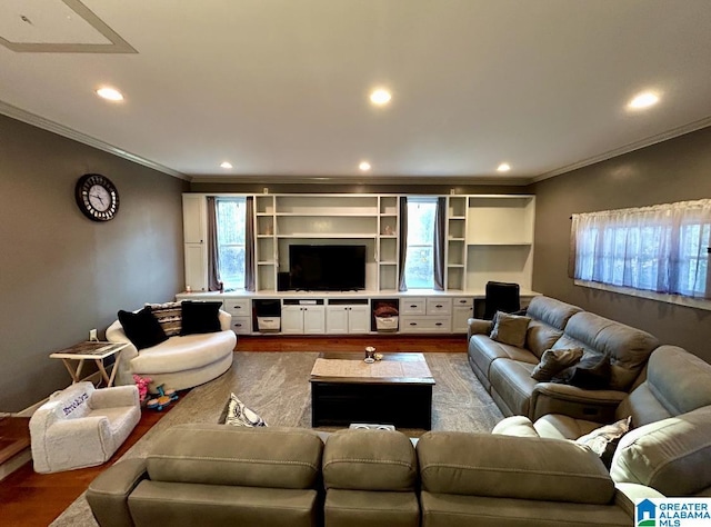 living room featuring ornamental molding, recessed lighting, and wood finished floors