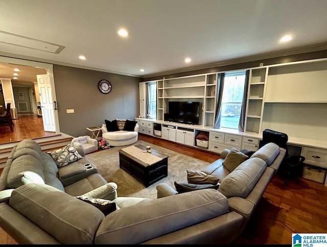 living room with ornamental molding, recessed lighting, and wood finished floors